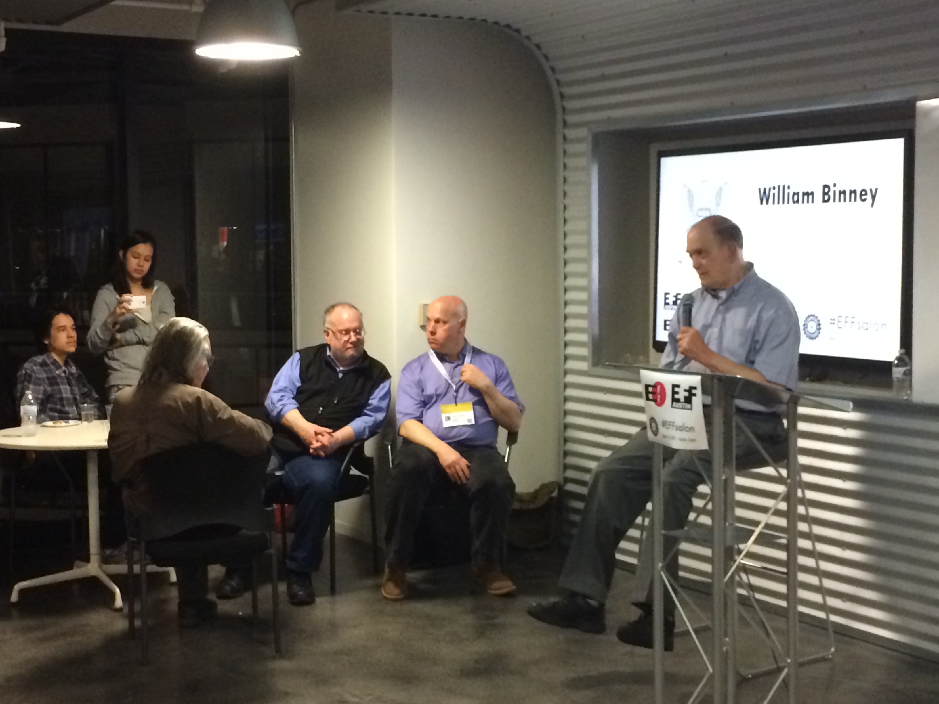 Bruce Sterling and Mike Godwin watch Bill Binney speaking at #EFFSalon