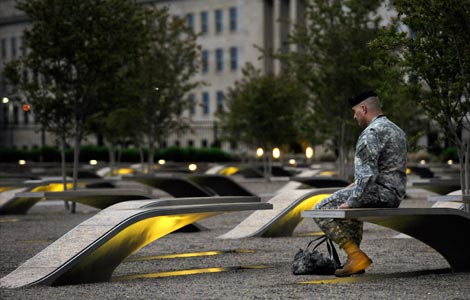 Soldier at the 9/11 Memorial at the Pentagon Photo by Matt McClain, The Washington Post/Getty Images
